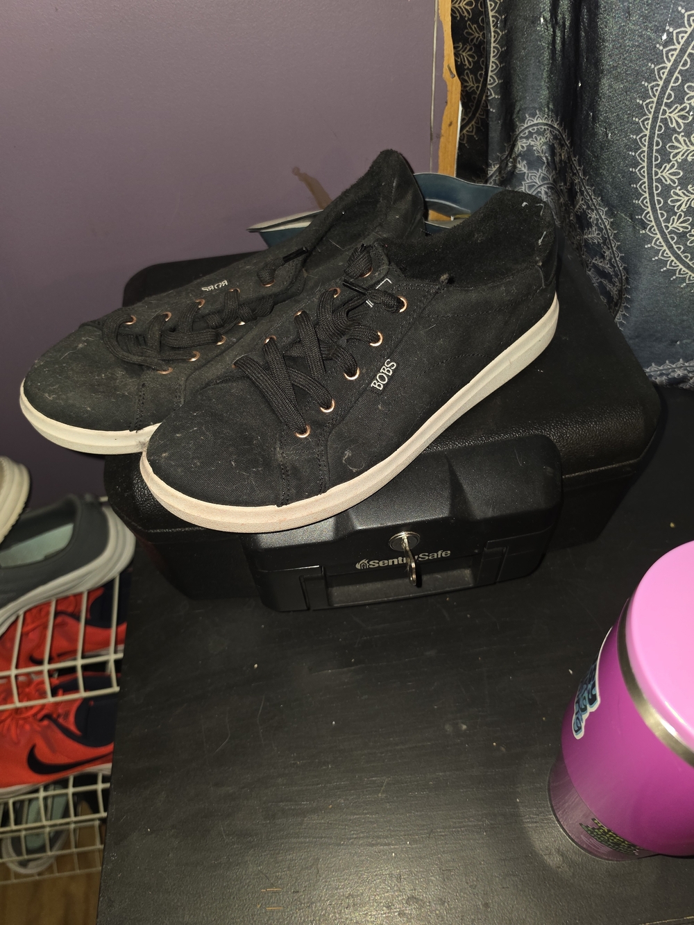Skechers Women’s Black Low-Top Sneakers with White Sole
